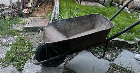Fotografie dětského zahradního kolečka a doplňků Woopie
